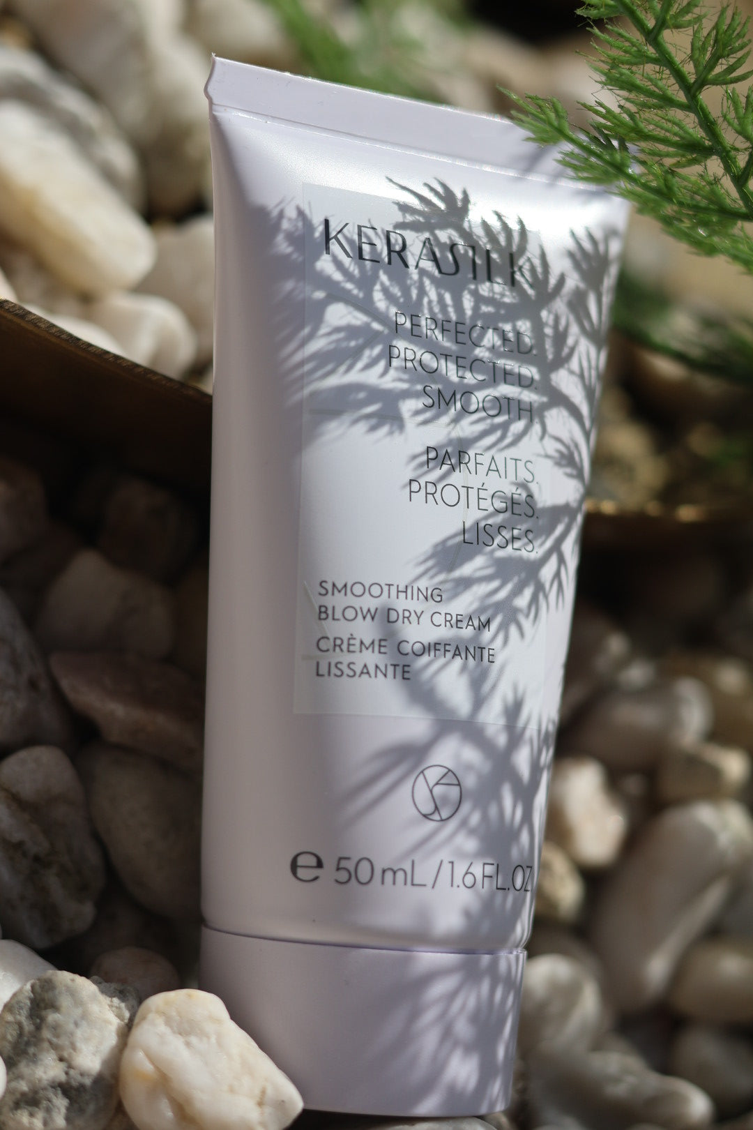 Smoothing blow-dry cream